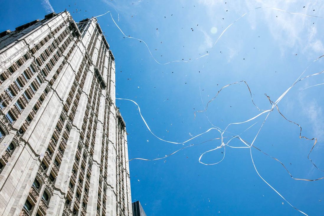 Ticker tape falling through the sky during the 2015 parade for the USWNT (Tod Seelie / Gothamist)